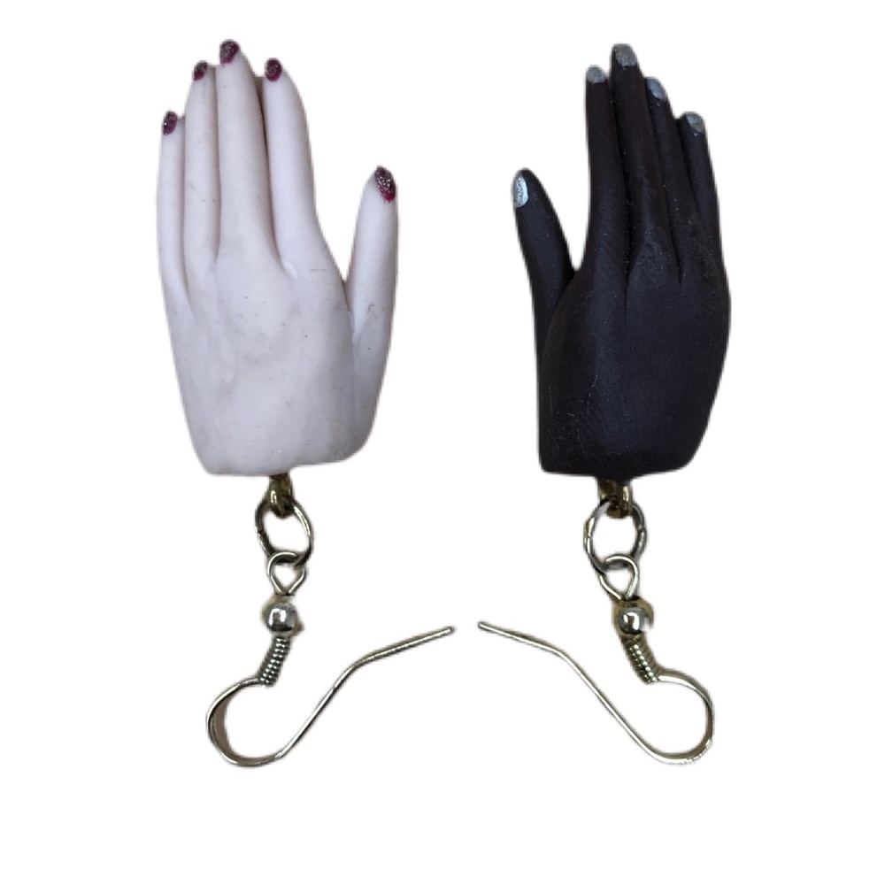 Tiny hand earrings hilarious